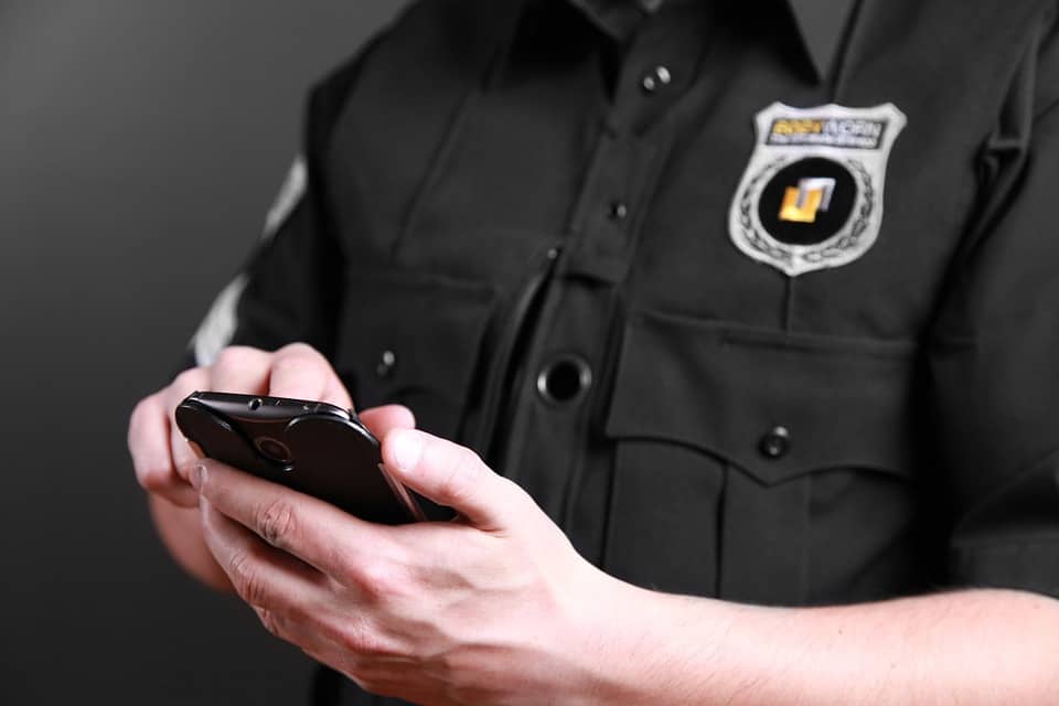 Police Officer on Cell Phone